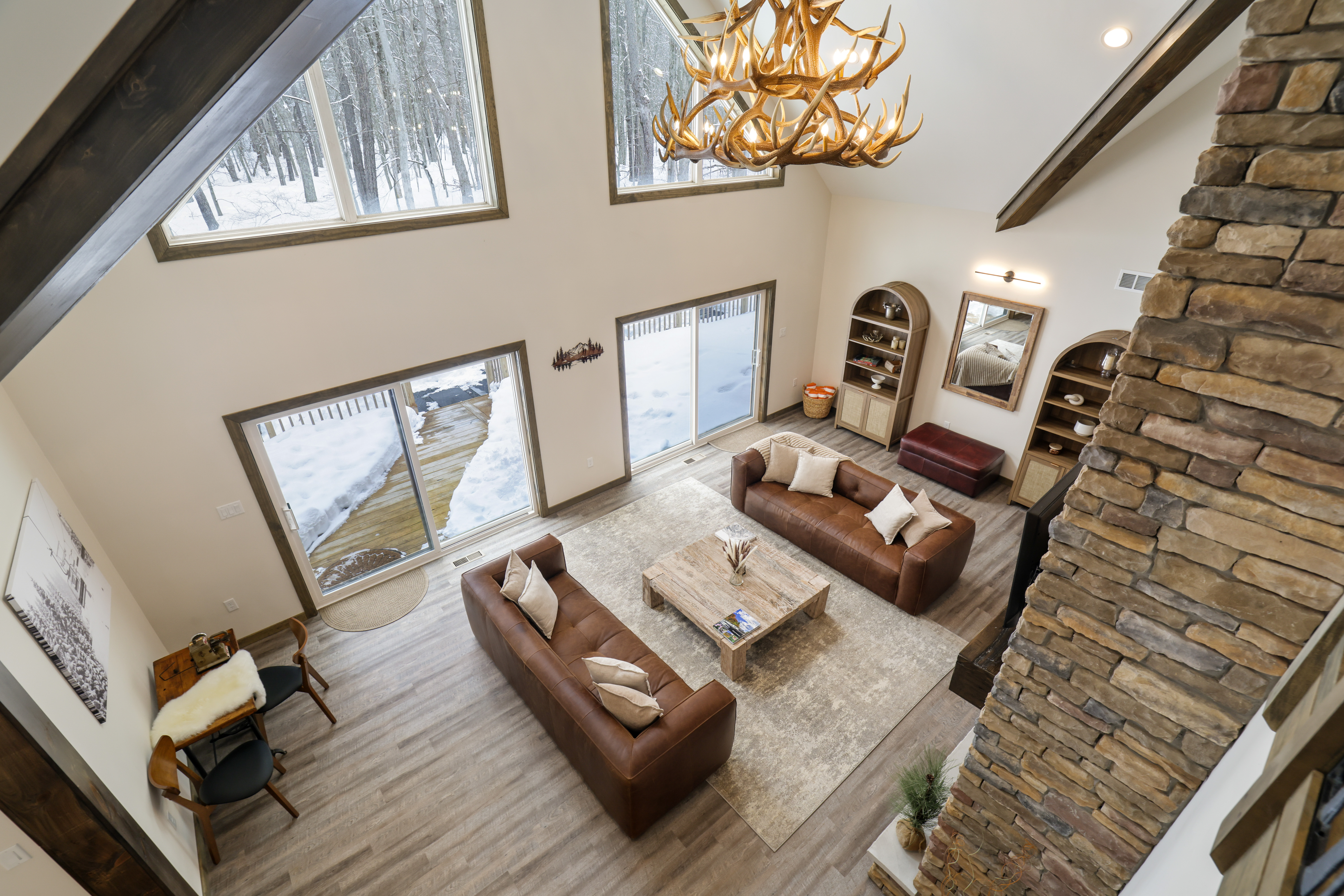 Great room with antler chandelier and mountain views